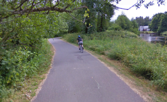Keeping bumps caused by tree roots is a never-ending battle on the trail. Image via Google Street View