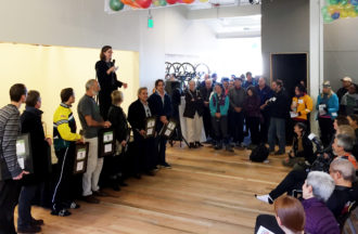 Elizabeth Kiker speaks at the opening of the Cascade Bicycling Center