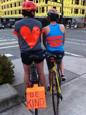 Two people call for care on the roads near the Ave and Campus Parkway at the 2011 Safe Streets Social