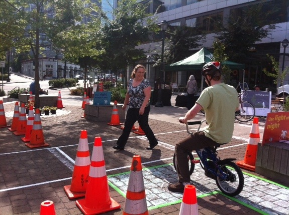 A temporary traffic garden as part of Park(ing) Day 2014. (feat. Gordon Padelford of Seattle Neighborhood Greenways)