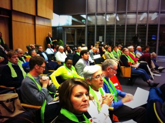 Seattle Neighborhood Greenways supporters donned green scarves to show their support for the plan