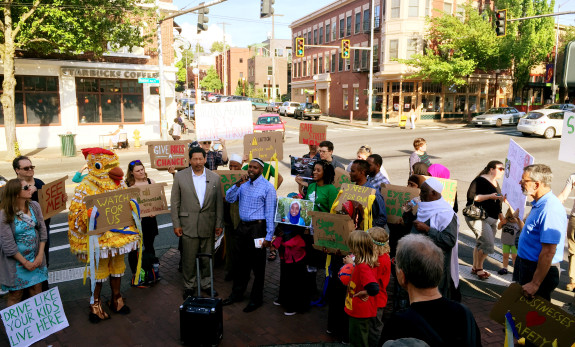 Then-Councilmember Bruce Harrell at a protest for a safer Rainier Ave.