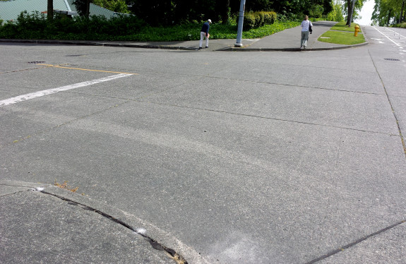 It took quite a while for the elderly gentleman to cross. Right-turning drivers can do so without slowing much here.