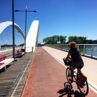 We stumbled on this awesome car-free (bike/walk/tram) bridge across the Rhône near the confluence in Lyon.