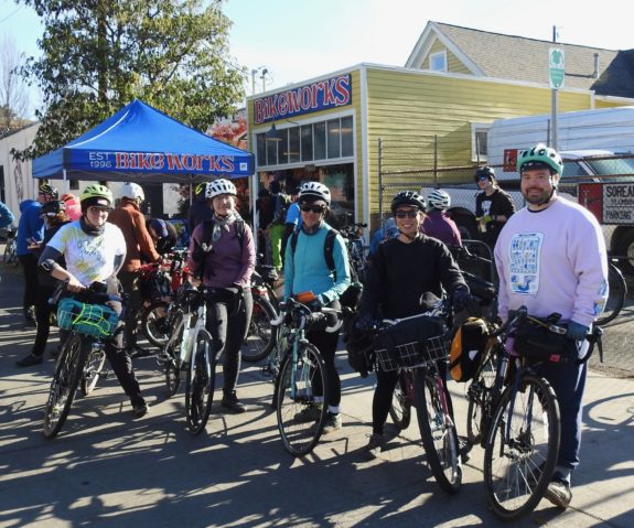 Riders in front of Bike Works.