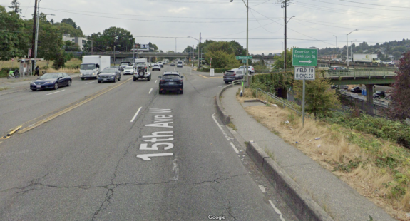 Google Street View image of the so-called merge of death, a cut out in the cement barrier between the sidewalk and street. Someone trying to continue south would need to walk or ride in traffic.