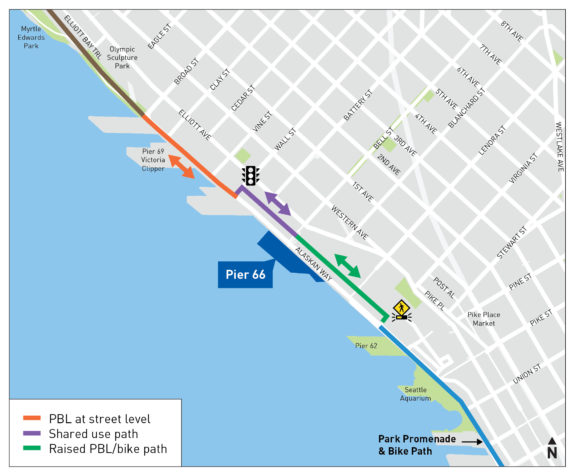 Map of the Alaskan Way Trail showing it crossing at a flashing crosswalk near Pier 62 then crossing again at a traffic signal at Wall Street.
