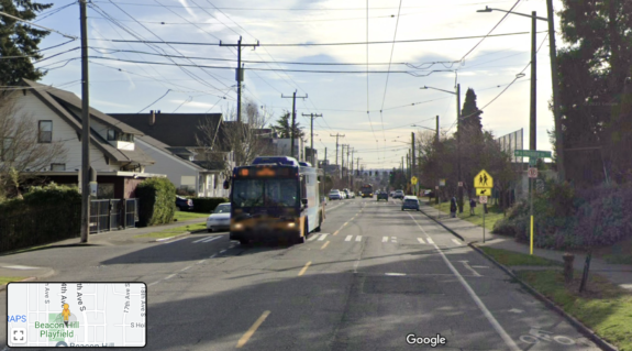 Street View image of 14th Ave S with a car parked in the bike lane.