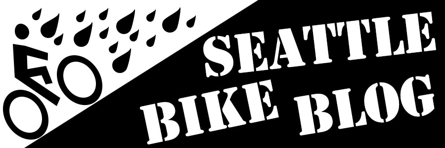Header image with black and white illustration of a stencil person biking up a hill with rain falling with text Seattle Bike Blog.